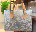 Cloud‑Butterfly Metal‑Element Tote Handbag