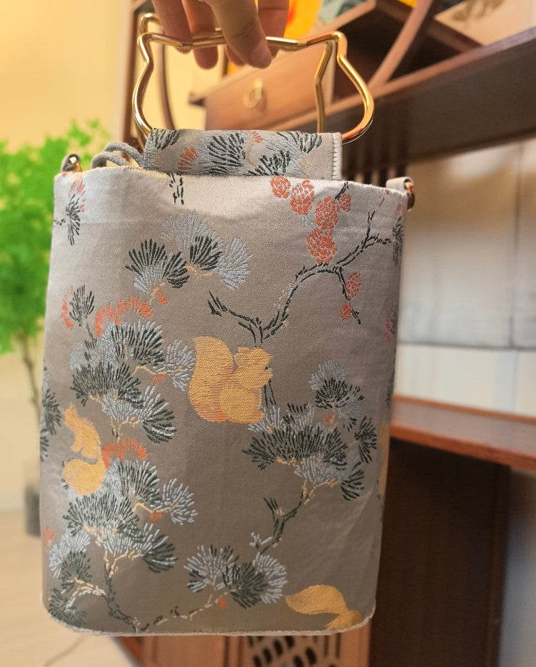 Pine Squirrel Wood‑Element Brocade Cylinder Handbag