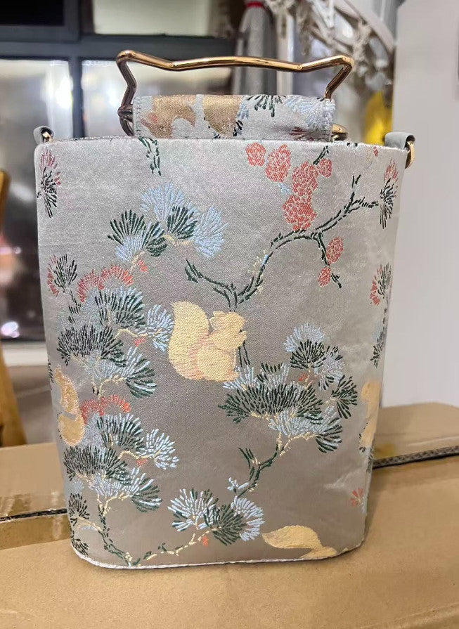 Pine Squirrel Wood‑Element Brocade Cylinder Handbag