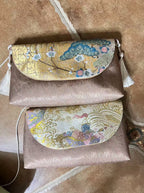 Gilded Brocade Metal‑Element Clutch Bag